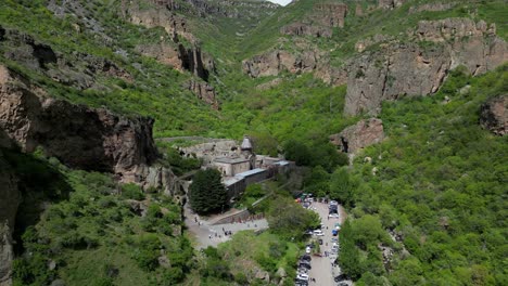 4K-drone-shot-of-the-Geghard-Monastery-tourist-site-in-Armenia-close-to-Yerewan