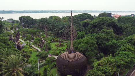 Panoramic-image-of-Buddha-Park-near-Vientiane,-the-capital-of-Laos,-with-the-famous-Mekong-River-in-the-background,-dividing-Laos-from-Thailand