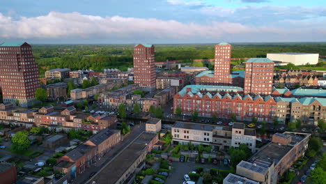 Aerial-view-at-golden-hour-with-modern-buildings-at-Amersfoort-Vathorst,-The-Netherlands