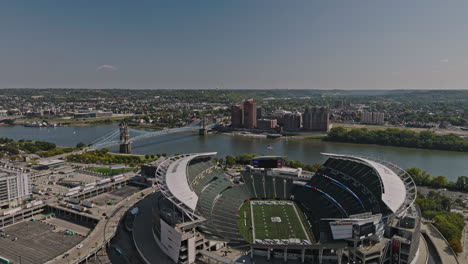 Cincinnati-Ohio-Aerial-v14-low-flyover-Paycor-Stadium-capturing-waterfront-sport-complex,-urban-park-and-river-crossing-bridges-and-downtown-cityscape---Shot-with-Inspire-3-8k---September-2023