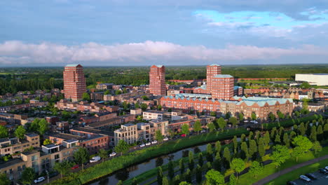 Aerial-view-at-golden-hour-with-modern-buildings-at-Amersfoort-Vathorst,-The-Netherlands