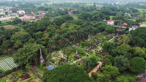 Drone-unveils-the-Buddha-Park-in-Laos,-a-magical-place-filled-with-religious-statues