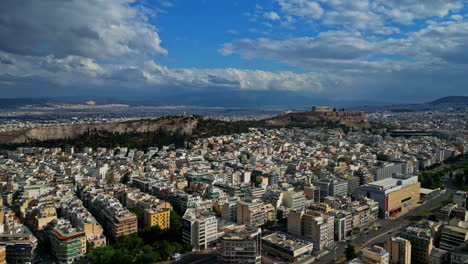 Aerial-dolly-in-greek-city-Athen-with-view-to-acropolis-and-mountain-panorama