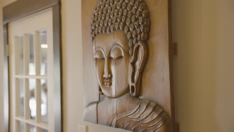 Handcrafted-wooden-wall-art-depicting-Buddha