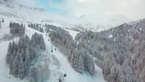 {Aerial}-Drone-View-above-a-french-snowy-ski-station-during-winter