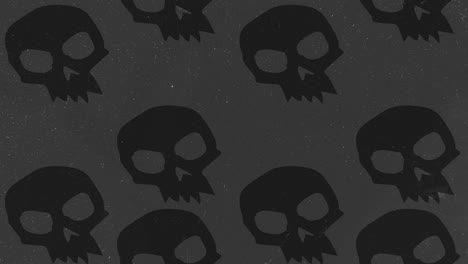 Halloween-Hintergrundanimation-Mit-Großen,-Wütenden-Schwarzen-Totenköpfen,-Die-Sich-über-Grauen-Hintergrund-Nach-Oben-Bewegen