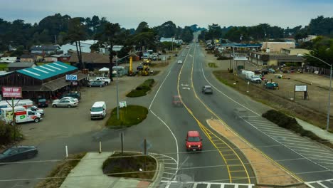 Panning-aerial-above-the-power-lines-of-Highway-One,-Fort-Bragg,-California