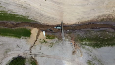 Aerial-view-of-boats-stuck-in-a-tributary-of-the-Rio-Negro-during-a-record-drought-the-hit-the-Amazon-region