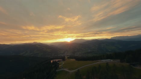 Aerial-shot-the-mountain-hill-during-sunset