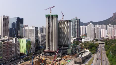 Mega-Building-Construction-site-in-downtown-Hong-Kong,-Aerial-view