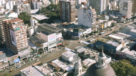 AERIAL---Cabildo-Avenue-in-Belgrano,-Buenos-Aires,-Argentina,-spinning-shot