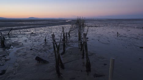 Carrasqueira-Palafitic-Pier-In-Comporta,-Portugal-Bei-Sonnenuntergang