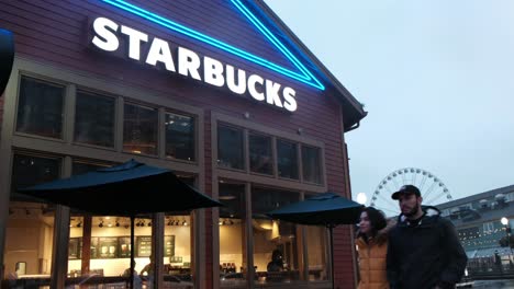 Starbucks-coffee-house-on-the-central-waterfront-of-Seattle,-Washington---the-most-urbanized-portion-of-the-Elliot-Bay-shore