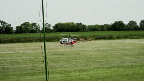 Radio-controlled-helicopter-model-is-exercising-landing-on-runway