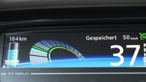 Shows-the-dashboard-display-of-an-electric-car-which-is-regenerative-braking