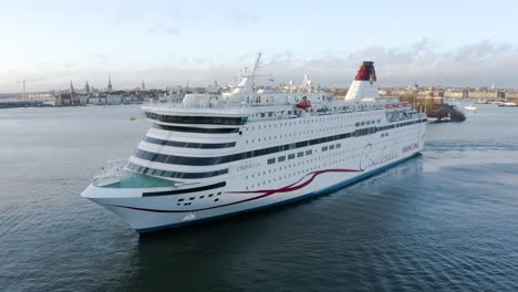 Viking-Line-Cinderella-cruise-ship-enters-Stockholm,-Stadsgården-terminal