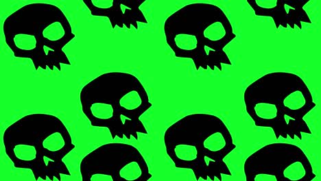 Animación-De-Fondo-De-Halloween-Grandes-Calaveras-Negras-Enojadas-Moviéndose-Hacia-Arriba-Sobre-Fondo-Verde