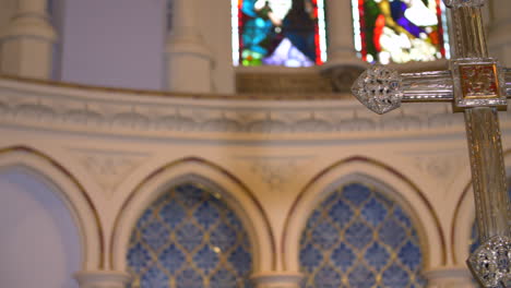 Golden-Silver-Cross-inside-St-Mary's-Church-Ealing-with-Arches-in-the-Background