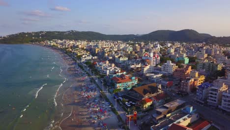 Aerial-establishing-shot-of-Bombas,-a-popular-beach-on-the-south-of-Brazil