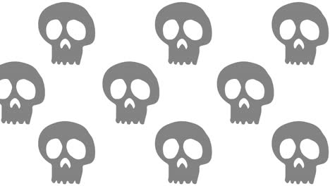 Halloween-Background-animation-large-neutral-black-skulls-moving-to-the-left-over-white-background