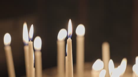 Candles-shining-and-oscillating-in-Church