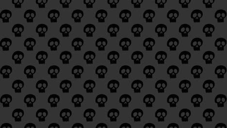 Animación-De-Fondo-De-Halloween-Pequeñas-Calaveras-Negras-Moviéndose-Hacia-Arriba-Sobre-Fondo-Gris