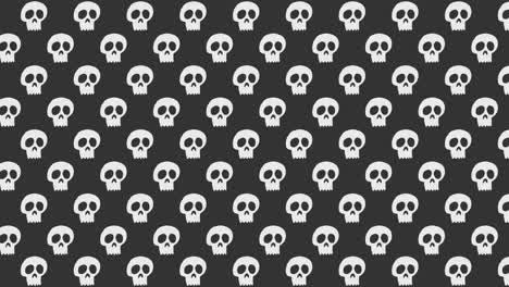 Animación-De-Fondo-De-Halloween-Pequeñas-Calaveras-Blancas-Moviéndose-Hacia-La-Izquierda-Sobre-Fondo-Gris