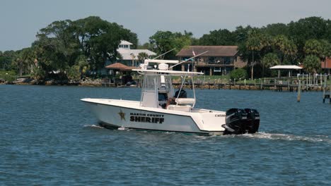 SLOMO:-Martin-County-Sheriff-boat-patrol-motoring-down-the-Stuart-Manatee-Pocket-waterway-in-Florida