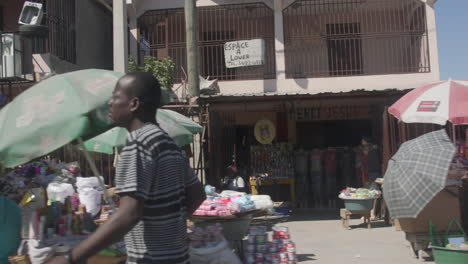 Driving-by-Haitian-street-market