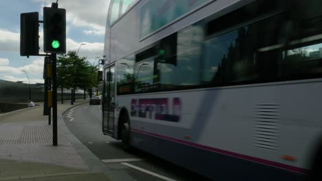 Long-take-of-Cars-passing-crossing-near-Sheffield-Train-Station-and-interchange-on-the-A61-Road-passing-through-Sheffield-4K-25p