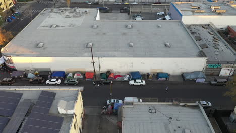 Drone-shot-showing-massive-homeless-encampment-in-Downtown-Los-Angeles's-Skid-Row