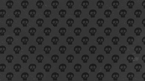 Halloween-Background-animation-small-black-skulls-moving-to-the-left-over-gray-background