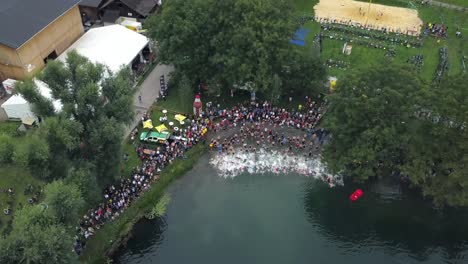 The-swimming-portion-of-a-triathlon-begins-near-Lake-Constance-in-Austria