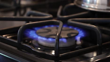 Tight-shot-of-kitchen-gas-range-lighting-with-fire