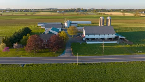 Golden-hour-sunset-over-classic-American-farm