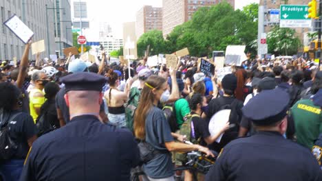 Police-Officers-Monitoring-a-large-Crowd-of-Protestors-during-a-Black-Lives-Matter-Protest-in-Brooklyn,-New-York-City