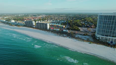 Aerial-flight-from-the-Gulf-of-Mexico-towards-Panama-City-Beach-condos