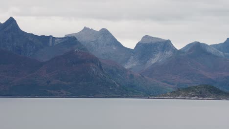 A-mountain-range-towers-above-the-calm-fjord