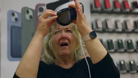 Mature-Caucasian-woman-expresses-amazement-after-using-a-virtual-reality-headset