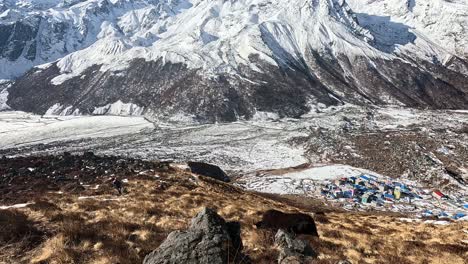 Aerial-view-on-the-vast-valley-and-the-picturesque-colorful-high-altitude-village-of-Kyanjin-Gompa