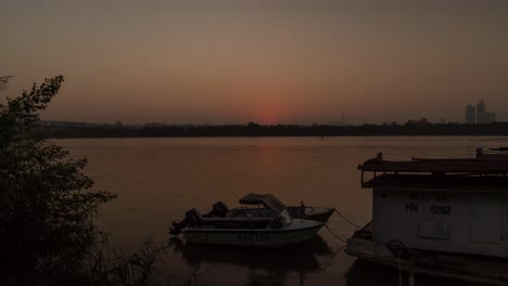 Hanoi,-Vietnam,-January-13-2023---Day-to-night-time-lapse-at-Red-River