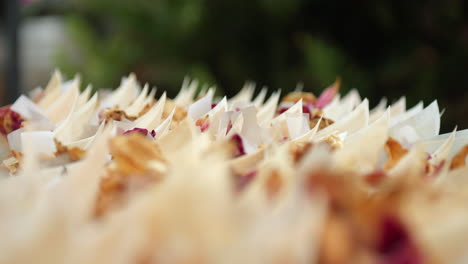 Rows-Of-Paper-Cones-Full-Of-Rose-Petals-Ready-For-Wedding-Recession