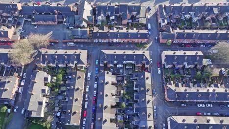A-cinematic-shot-from-above-over-the-rooftops-of-residential-houses-in-Derby,-UK