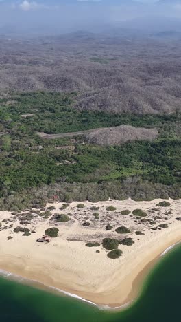 Cacaluta-Bay,-the-heart-shaped-bay-in-Huatulco-Oaxaca,-vertical-mode