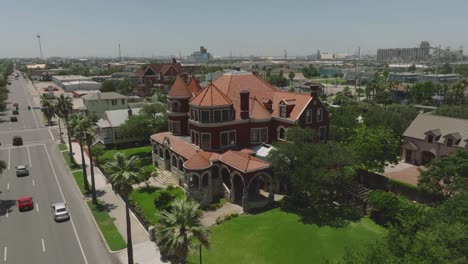 An-aerial-half-orbit-view-of-The-Moody-Mansion,-a-thirty-one-room-Romanesque-mansion-named-for-William-Lewis-Moody-Jr