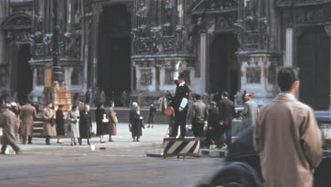 Traffic-Officer-Stands-in-the-Middle-of-the-Street-in-Front-of-Milan-Cathedral