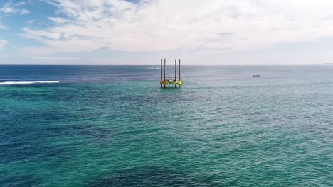 Slow-dolly-right-clip-of-drilling-platform-operating-near-Eden-Beach,-Perth