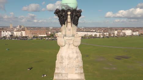 Dropping-drone-footage-of-Navy-War-Memorial-Southsea-with-Southsea-Common-behind-on-bright-sunny-day