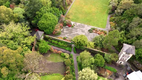 Ireland-Epic-locations-drone-flyover-of-the-Gardens-of-Garnish-Island,-which-is-located-at-Glengariff-West-Cork-on-a-summer-evening