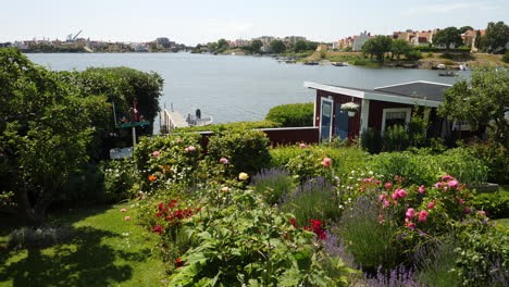 Swedish-Summer-House-with-Garden-at-Brandaholm,-Karskrona,-Sweden,-Tilt-Up